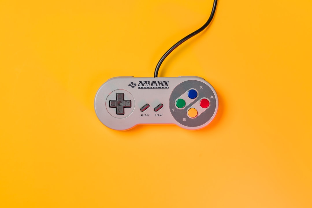 Controle de videogame clássico com botões visíveis